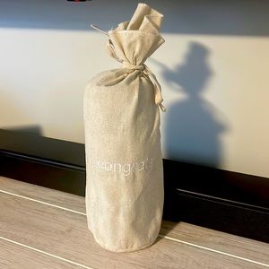 Congrats bag! With two stemless wine glasses